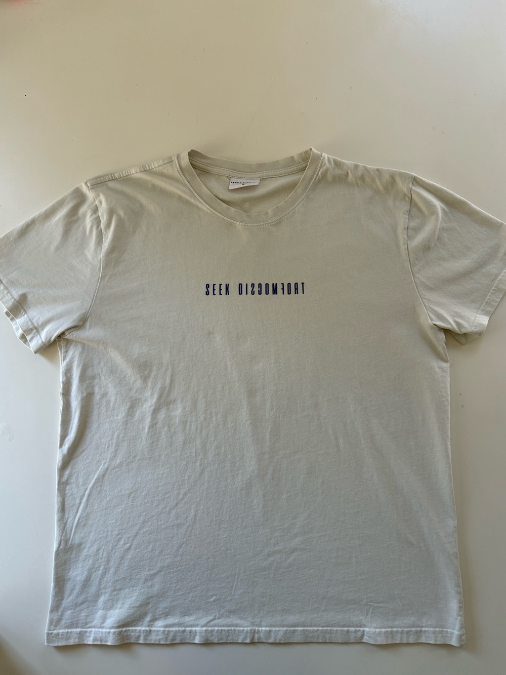 Seek Discomfort Off White Graphic T-Shirt